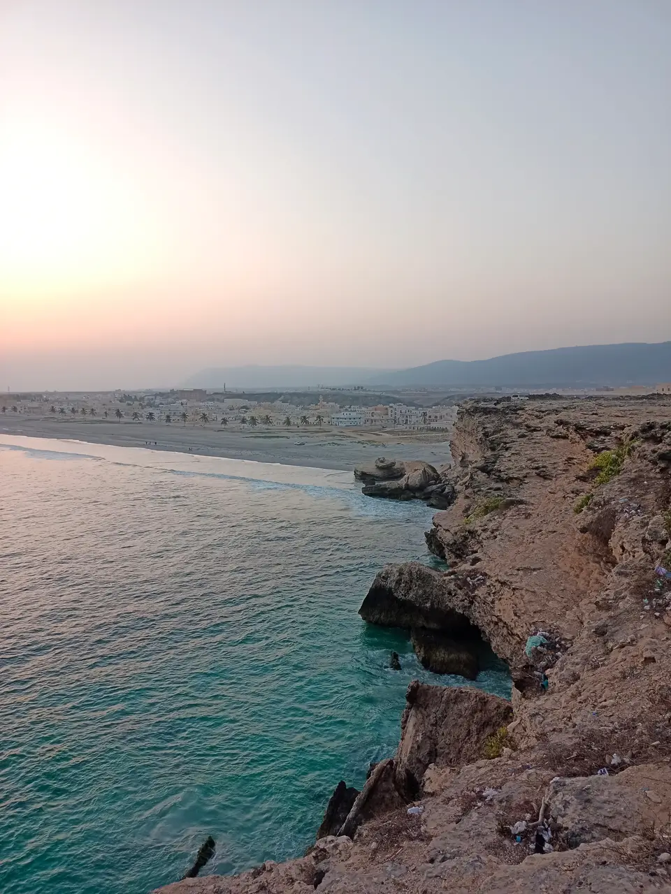 Mountains meeting the coastline near Salalah, Oman